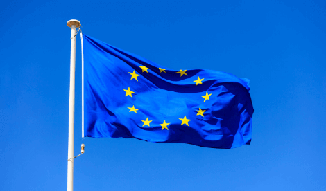 European union flying flag signifying delay to DAC 6