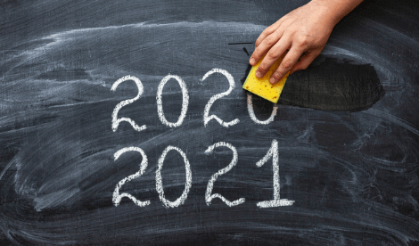 Scrubbing out 2020 off from chalkboard