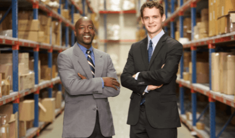 business partners in warehouse environment