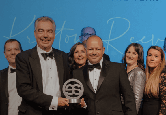 About our firm. Image shows Kreston Reeves staff on stage as winner of Large Firm of the Year 2021 at the Accounting Excellence awards.