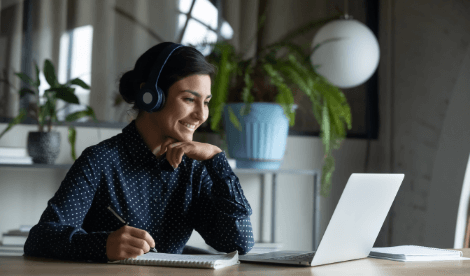 Lady smiling at screen