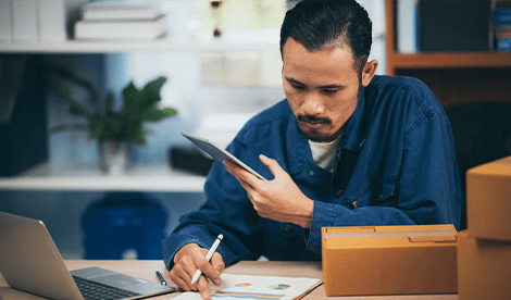 Business man working with an online system cloud accounting package in office